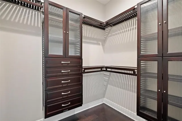 an aerial view of lake and residential houses with outdoor space