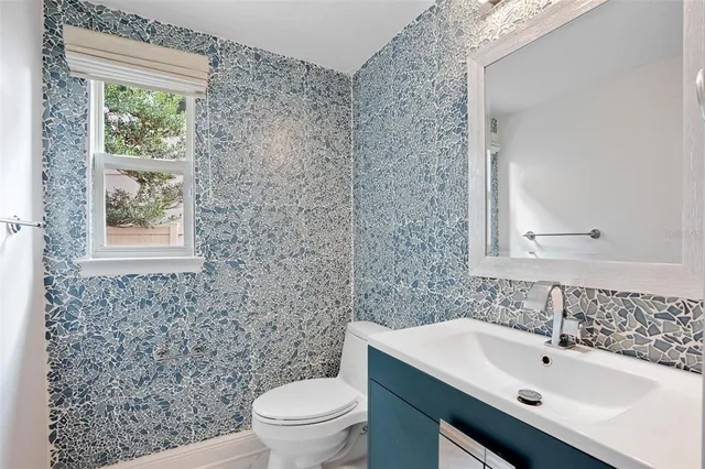 an aerial view of residential house with outdoor space