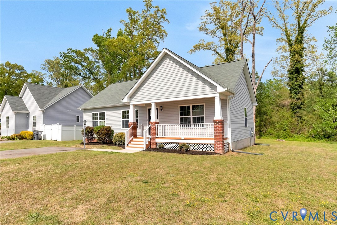 9925 Reymet Court Richmond, VA 23237 - Photo 2 of 30 a view of a house with a yard