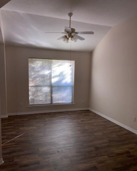 12307 Longfellow Drive Montgomery, TX 77356 - Photo 13 of 23 a view of an empty room with wooden floor and a window