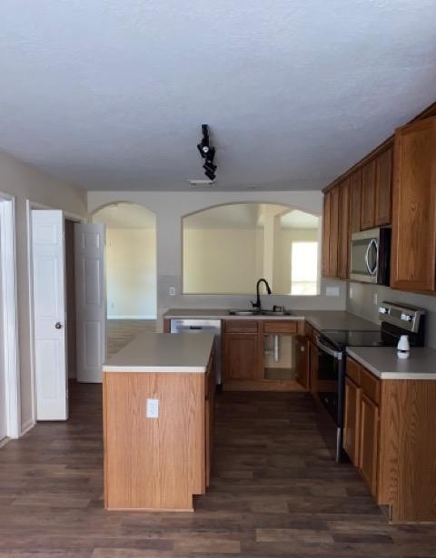 12307 Longfellow Drive Montgomery, TX 77356 - Photo 21 of 23 a kitchen with a sink and wooden floor