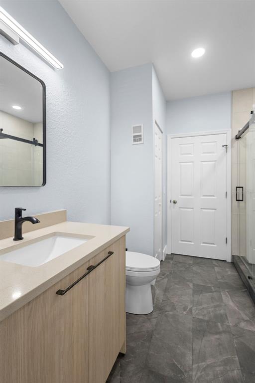 822 Camargo Way, Unit 307 Altamonte Springs, FL 32714 - Photo 18 of 46 a bathroom with a sink toilet and shower