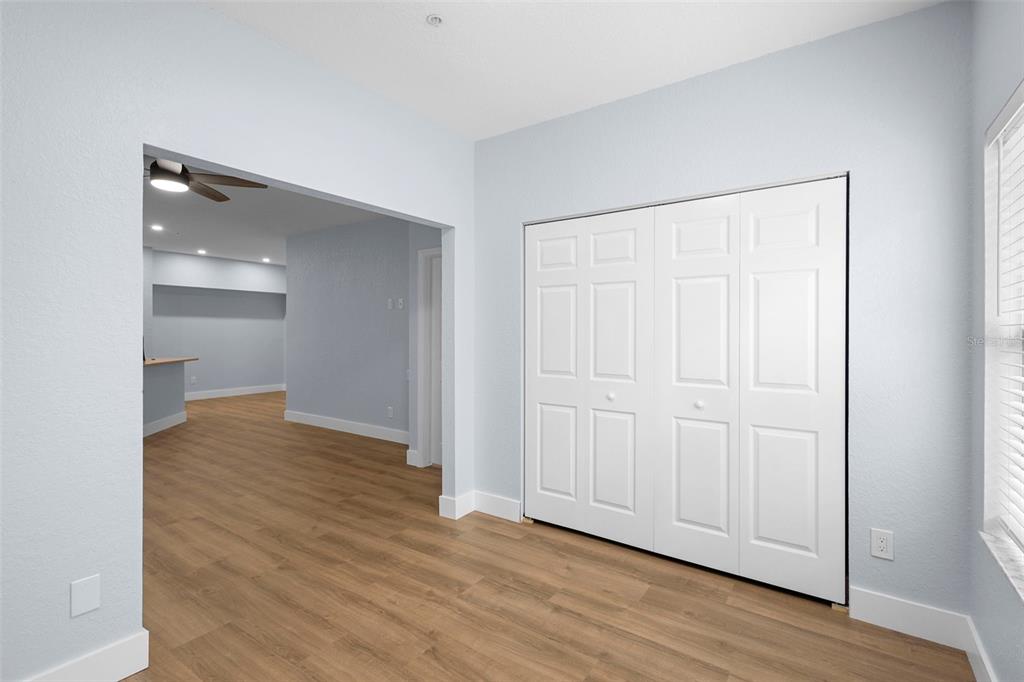 822 Camargo Way, Unit 307 Altamonte Springs, FL 32714 - Photo 30 of 46 a view of empty room with wooden floor