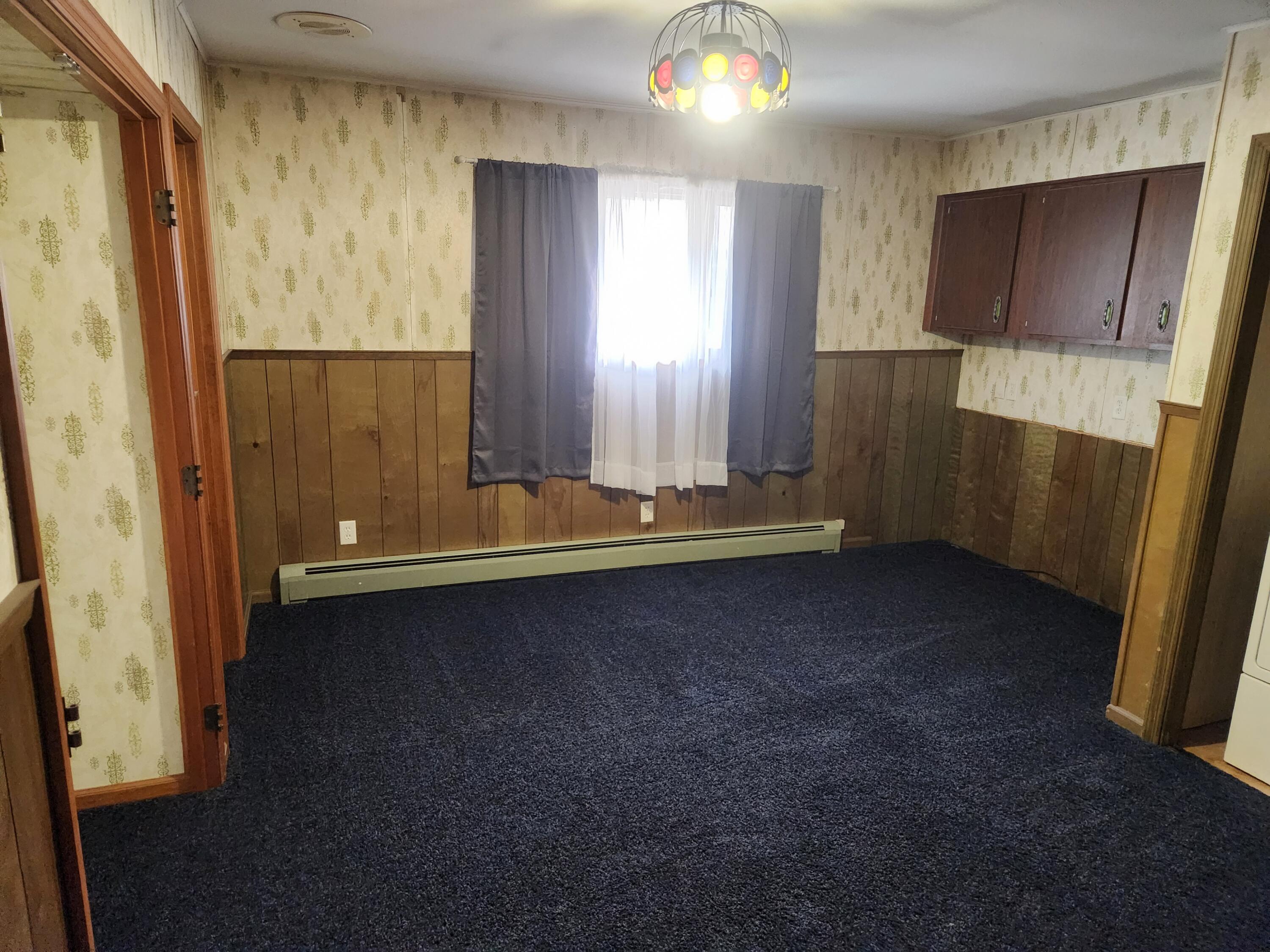4726 Locksley Drive East Rensselaer, IN 47978 - Photo 20 of 33 a view of room with window and wooden floor