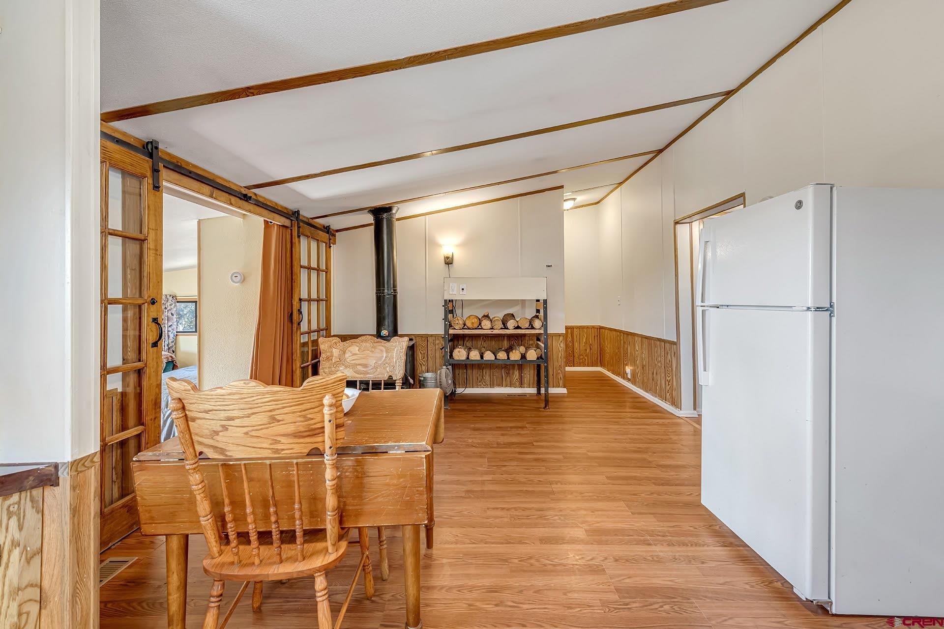 20984 Upland Road Cedaredge, CO 81413 - Photo 18 of 34 a living room with furniture and a table