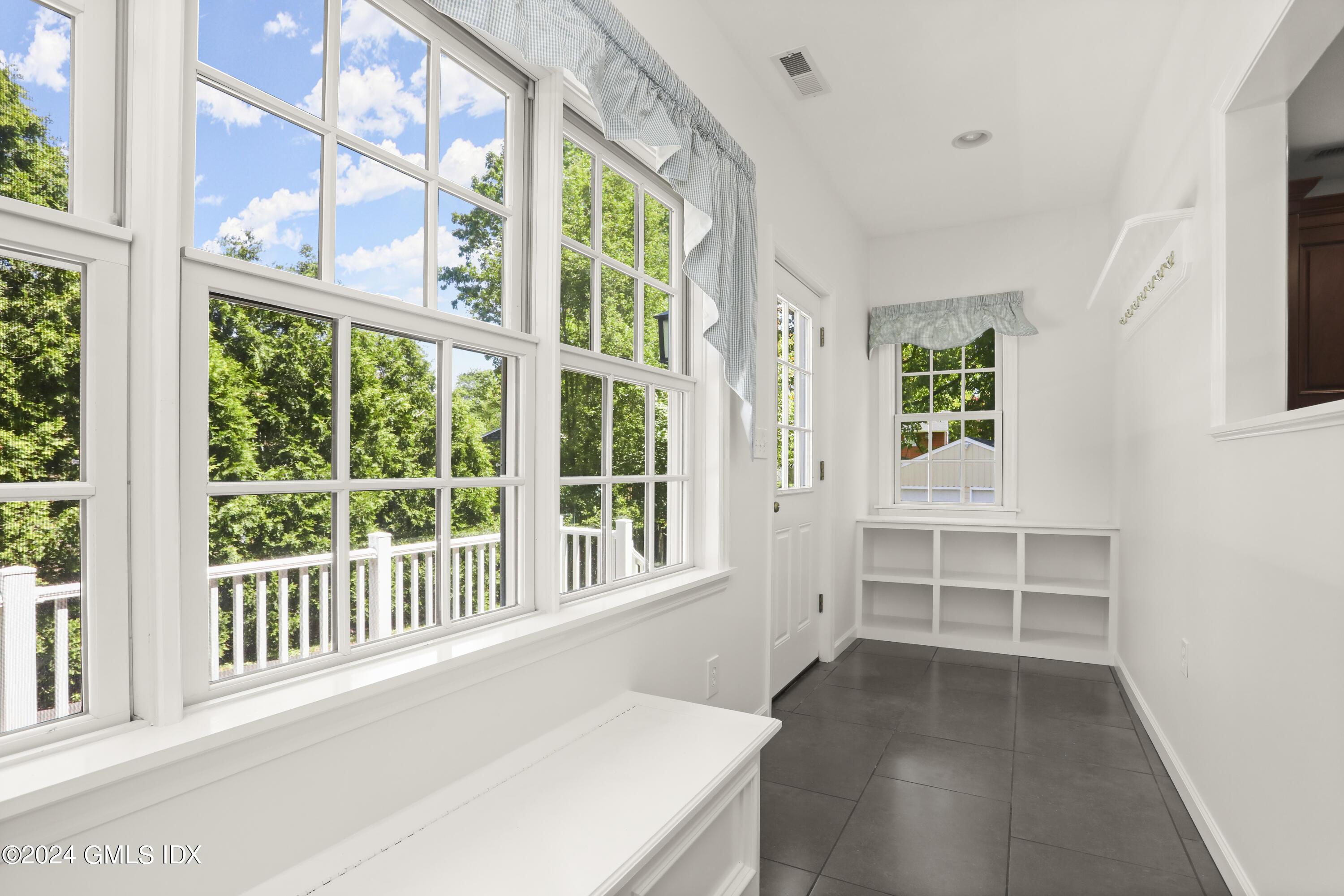 24 Sunshine Avenue Riverside, CT 06878 - Photo 3 of 20 an empty room with windows