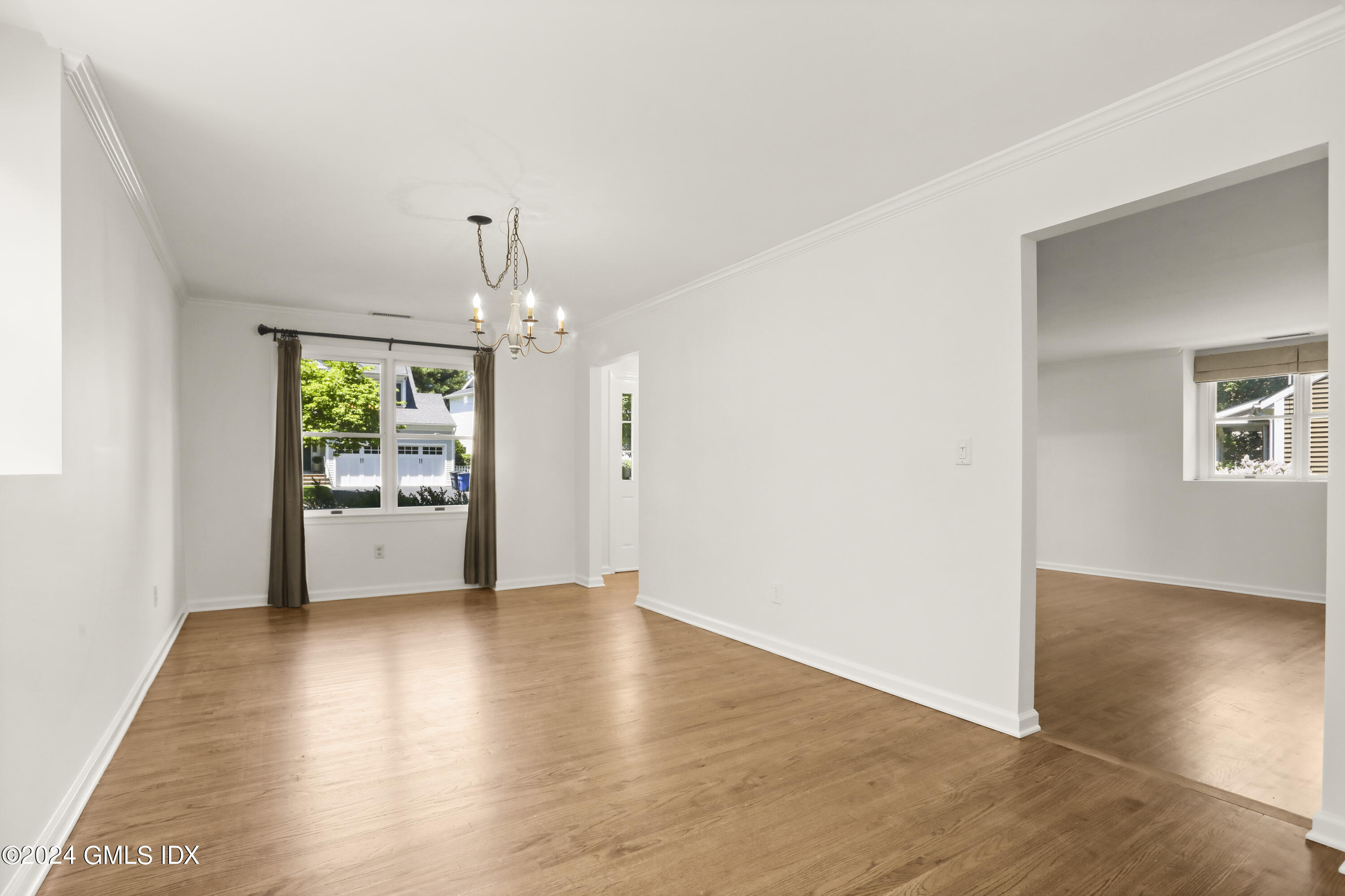 24 Sunshine Avenue Riverside, CT 06878 - Photo 8 of 20 a view of a kitchen and an empty room