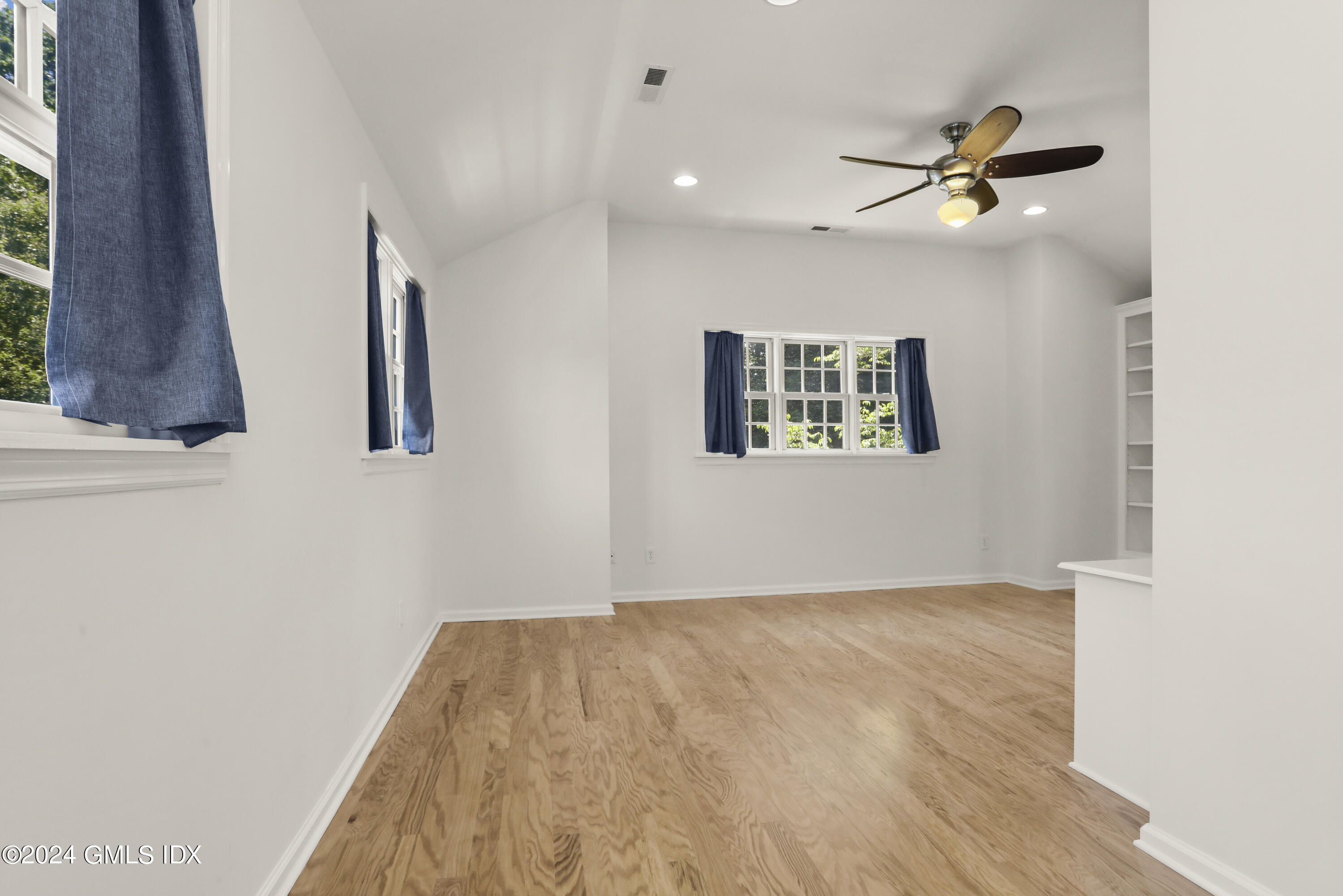 24 Sunshine Avenue Riverside, CT 06878 - Photo 9 of 20 a view of room with window and ceiling fan