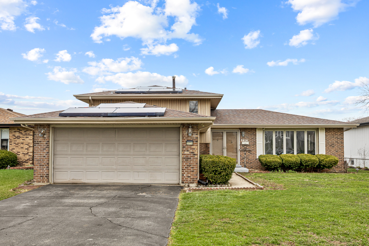 5916 West 127th Street Alsip, IL 60803 - Photo 2 of 22 a front view of house with yard