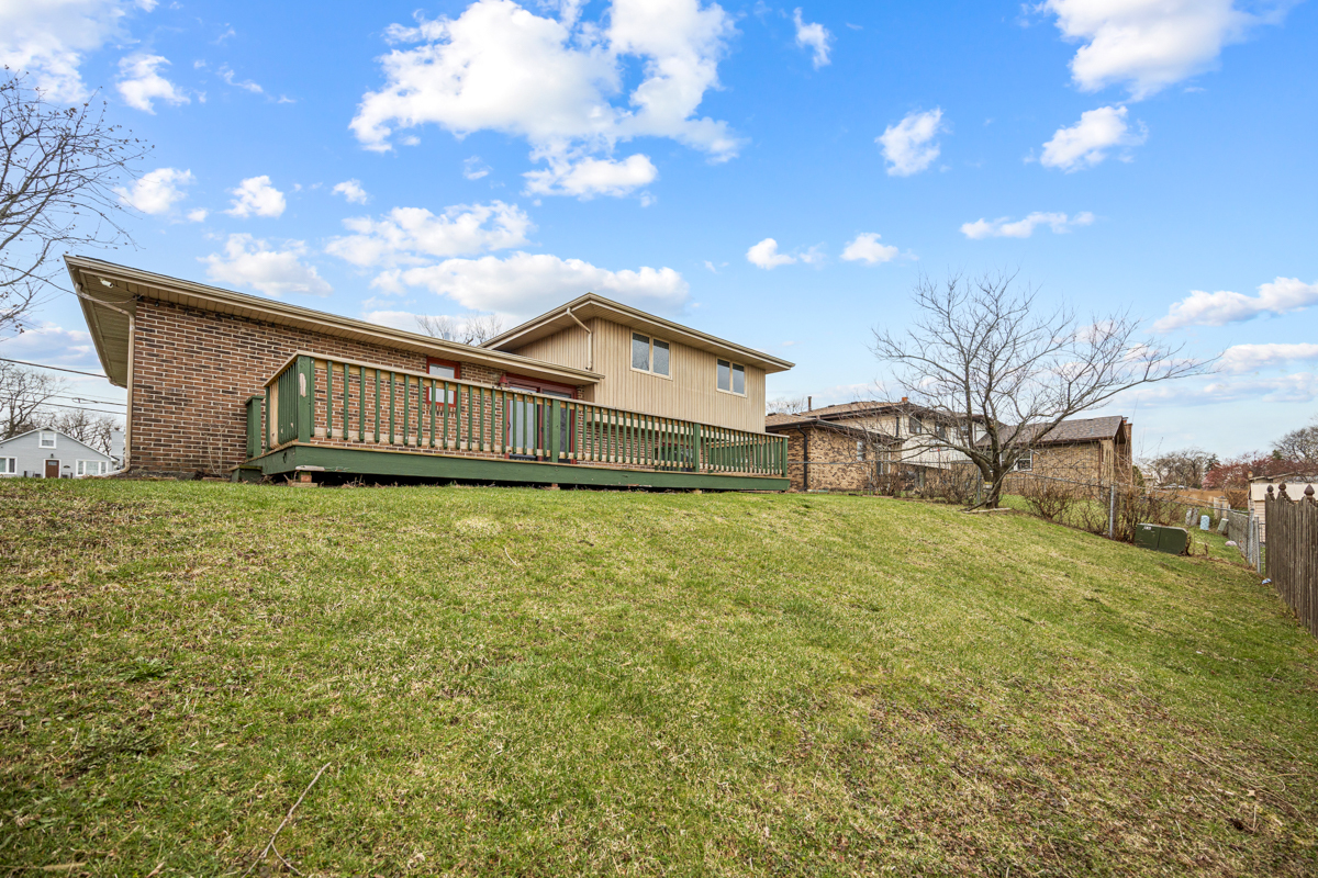 5916 West 127th Street Alsip, IL 60803 - Photo 22 of 22 a view of a house with a yard