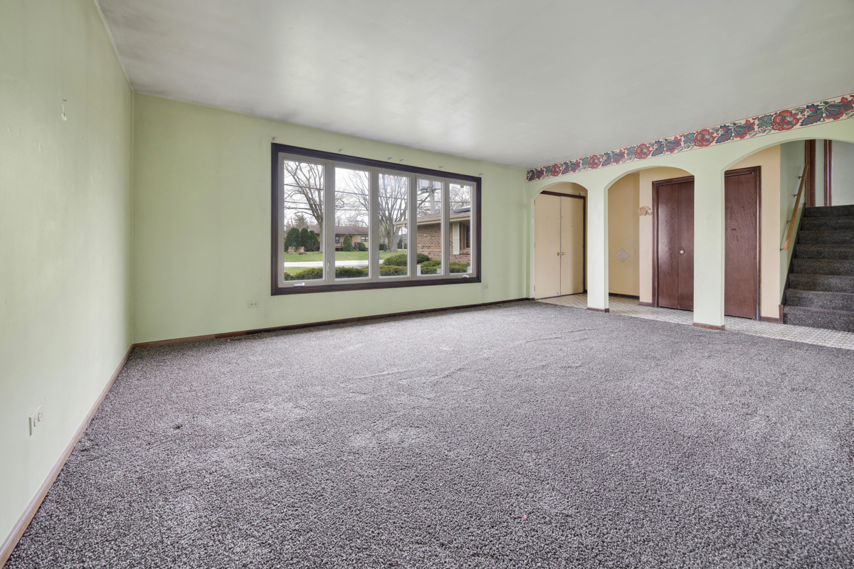 5916 West 127th Street Alsip, IL 60803 - Photo 5 of 22 an empty room with windows and view of walls