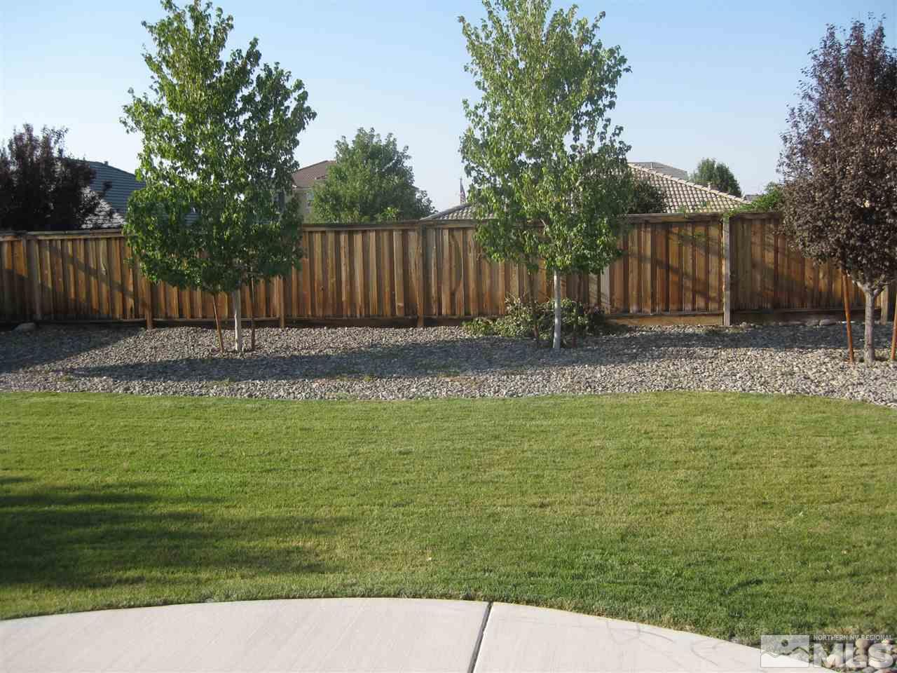 385 Pesaro Way Reno, NV 89521 - Photo 15 of 16 a backyard of a house