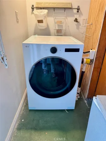 a utility room with a washer and dryer