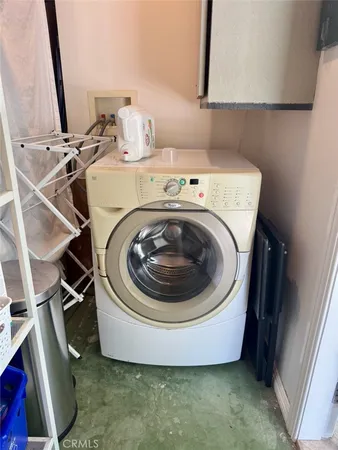 a utility room with a washer and dryer