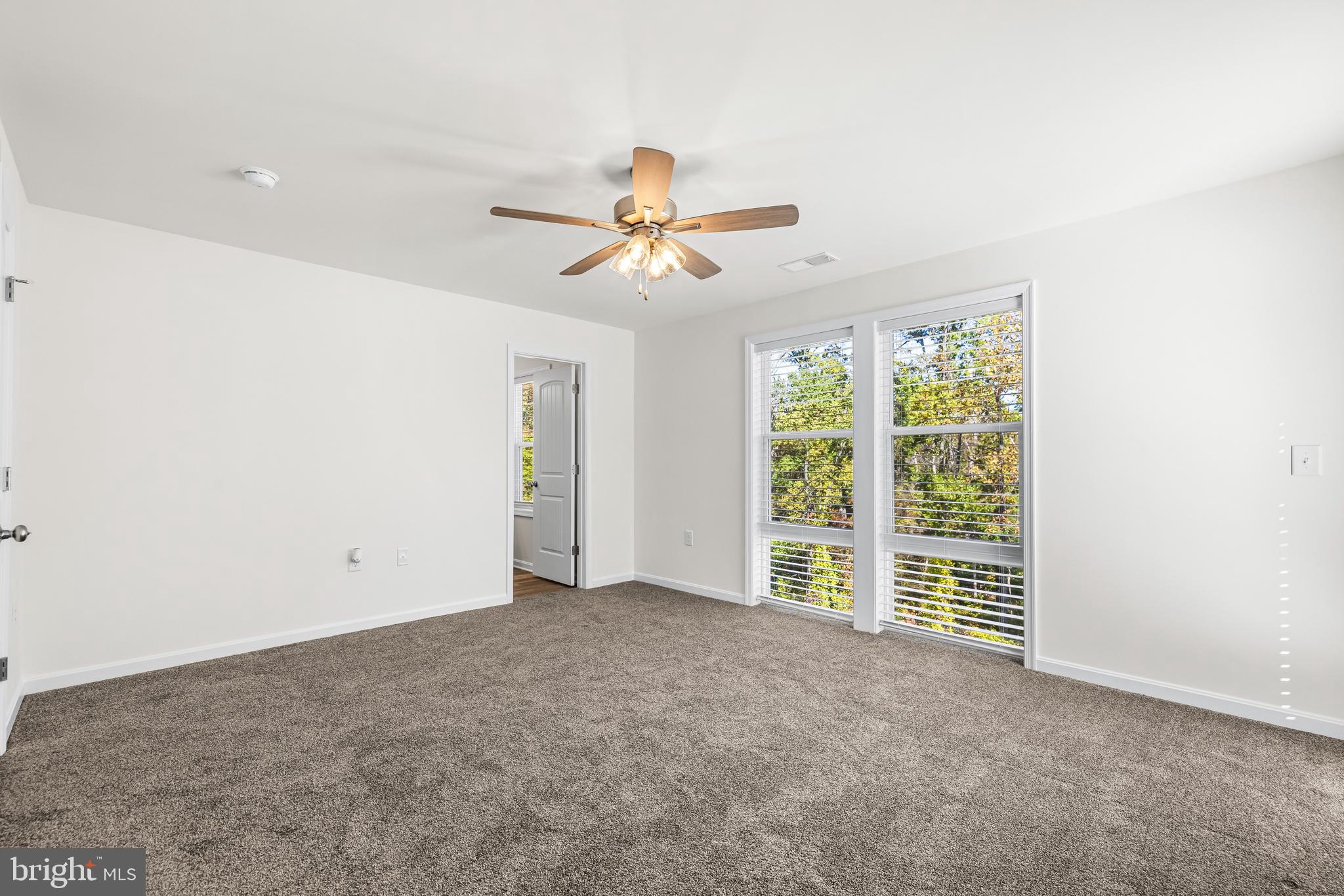 900 Gilbert Road, Unit 3644A Aberdeen, MD 21001 - Photo 15 of 23 an empty room with windows and fan