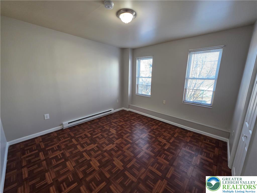 609 Walnut Street, Unit A Easton, PA 18042 - Photo 4 of 8 a view of an empty room and window