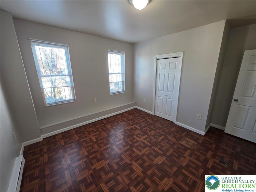 609 Walnut Street, Unit A Easton, PA 18042 - Photo 5 of 8 a view of an empty room and window