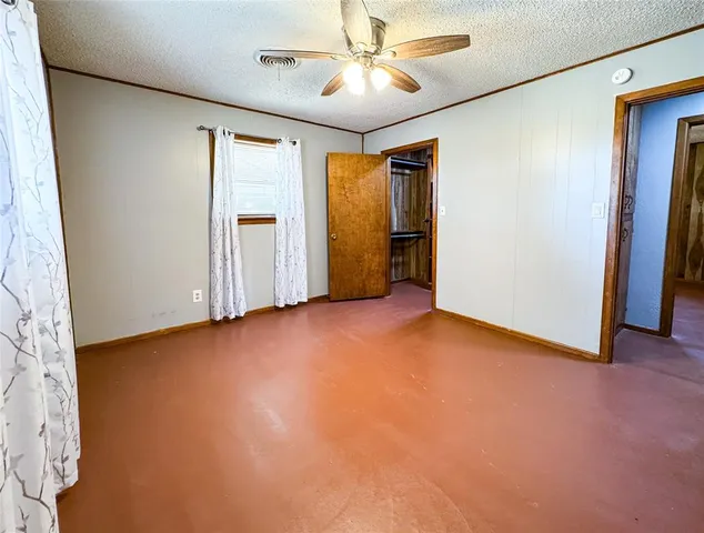 a house view with a backyard space