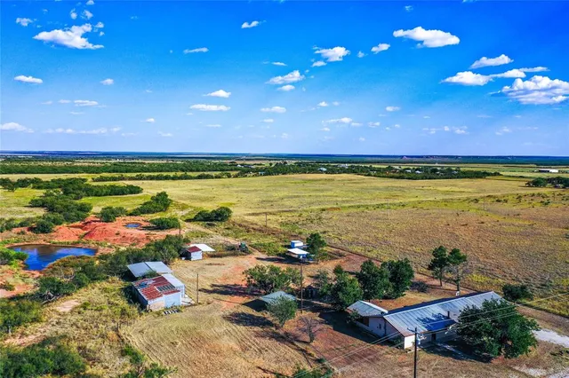 a view of an ocean and city