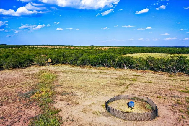 a view of an ocean and a yard