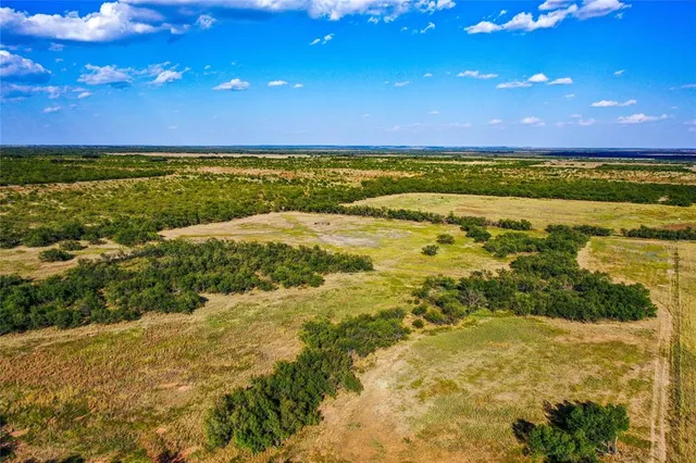 a view of an ocean and a building