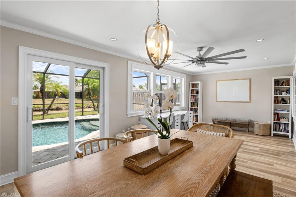 109 Doral Circle Naples, FL 34113 - Photo 2 of 17 Dining area, Flex Space and sliders to lanai