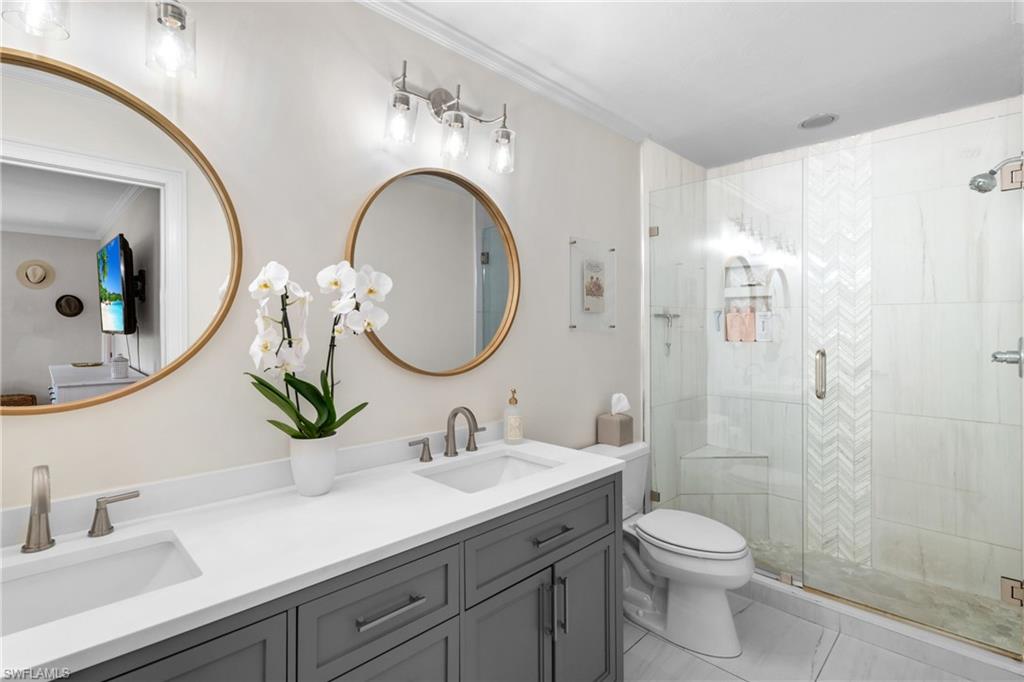 109 Doral Circle Naples, FL 34113 - Photo 10 of 17 Primary Bathroom