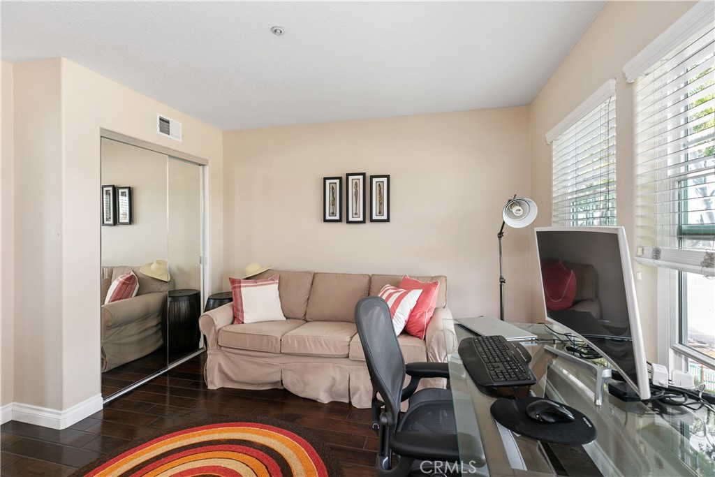 10 Crivelli Aisle Irvine, CA 92606 - Photo 12 of 28 Loft adjacent to master bedroom - with mirrored wardrobe