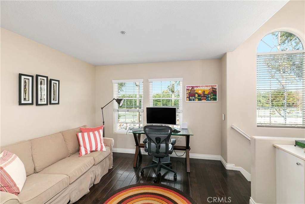 10 Crivelli Aisle Irvine, CA 92606 - Photo 13 of 28 Loft at rear of home looks out over and beyond the San Diego Creek river bed and walk/bike trail