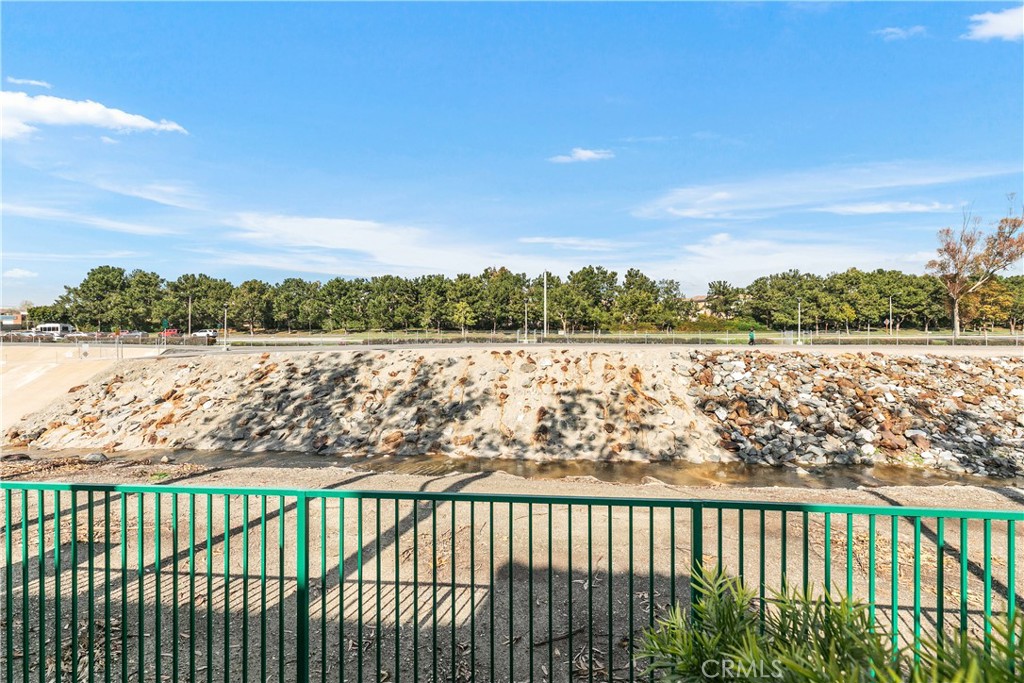 10 Crivelli Aisle Irvine, CA 92606 - Photo 19 of 28 View from behind the private patio - overlooking the San Diego Creek river bed and walking trail