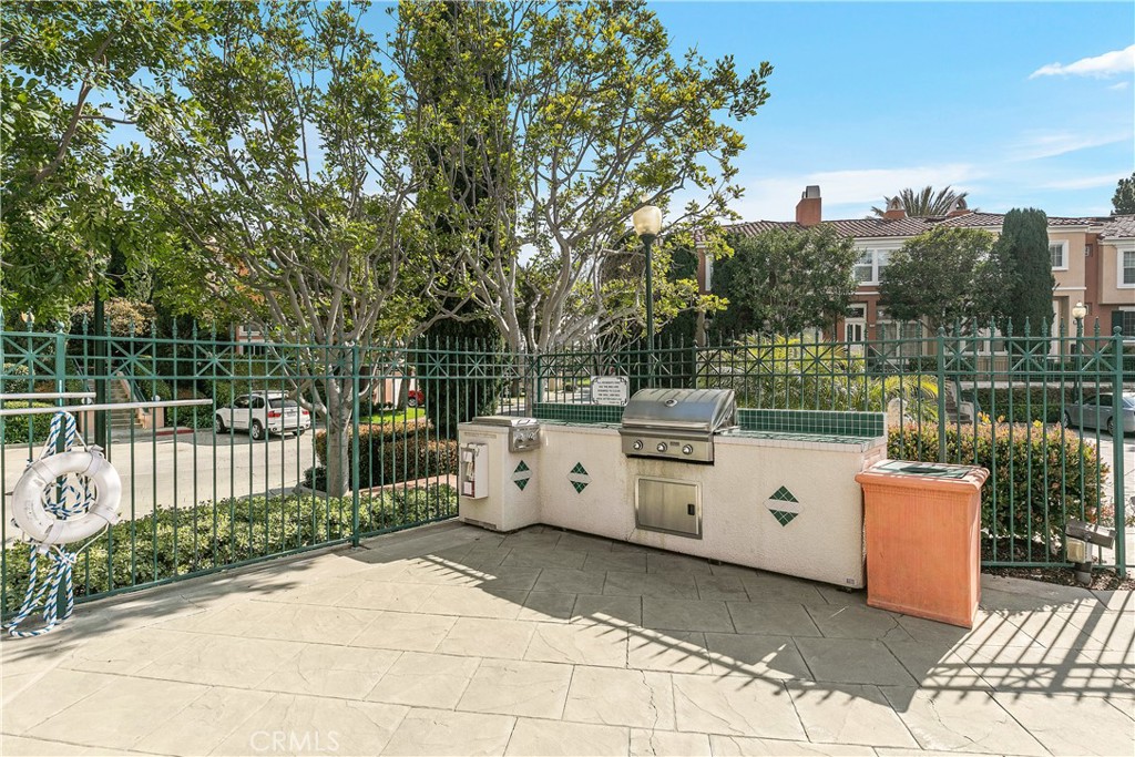 10 Crivelli Aisle Irvine, CA 92606 - Photo 24 of 28 Barbeques ready for use at the community pool area - at 10 Crivelli Aisle, Irvine