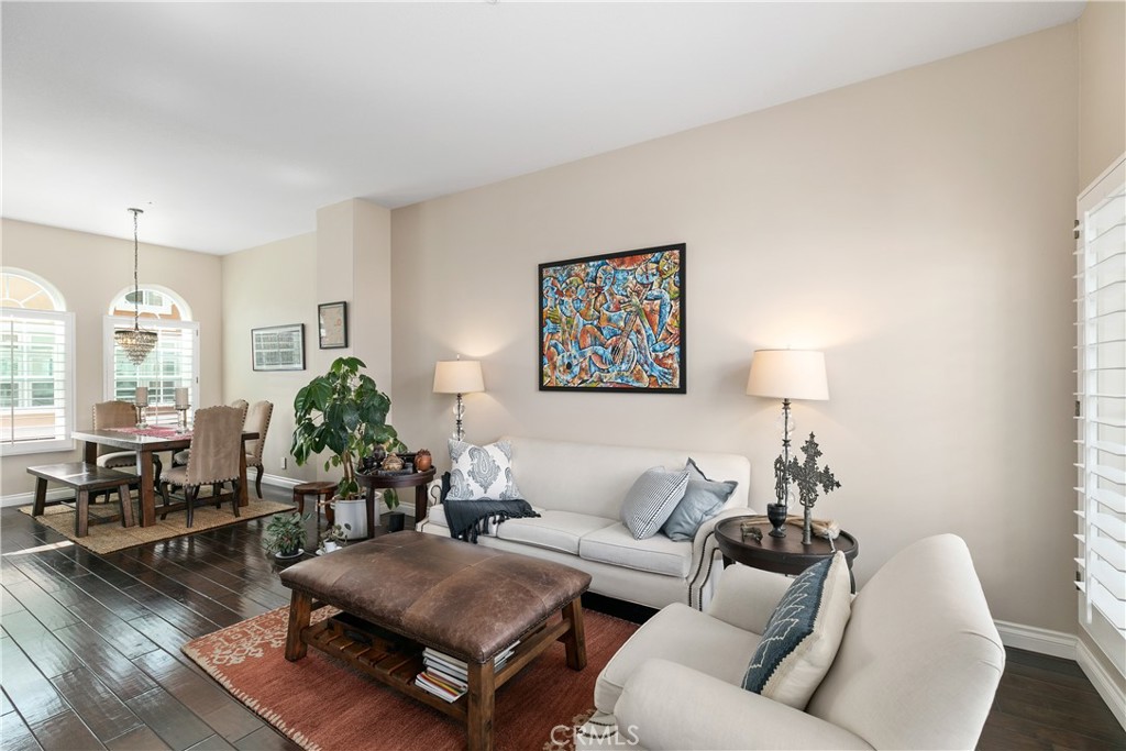 10 Crivelli Aisle Irvine, CA 92606 - Photo 3 of 28 Spacious living and dining great room with gorgeous wood floors, beautiful windows and abundant natural light