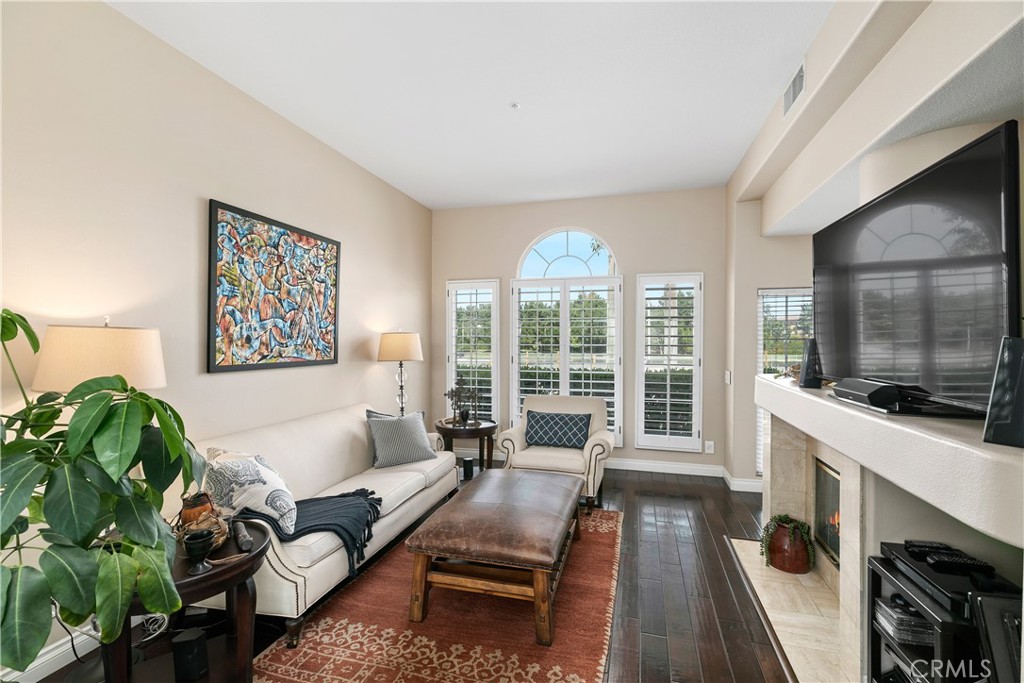 10 Crivelli Aisle Irvine, CA 92606 - Photo 4 of 28 High, open ceilings throughout; view from great room toward rear of home and over the San Diego Creek river bed and walk/bike trail