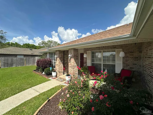 front view of a house with a yard