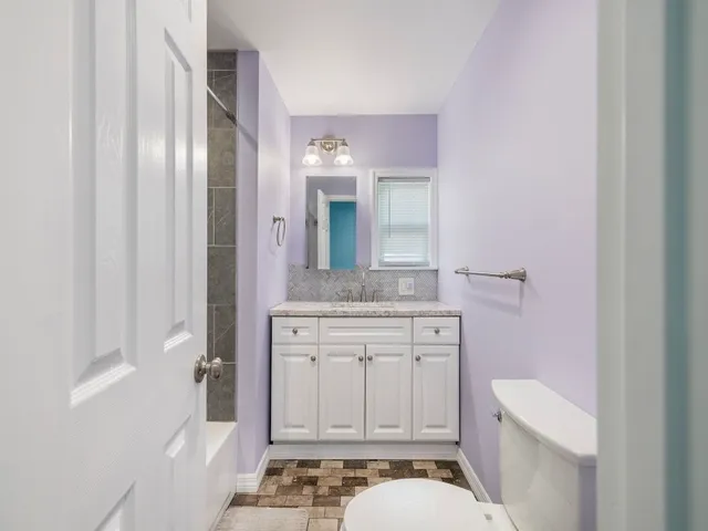 a view of a swimming pool and an outdoor space