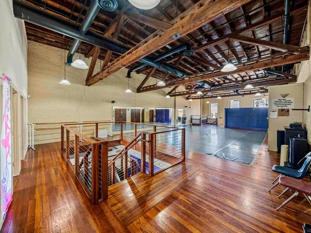 a view of a swimming pool with a wooden deck