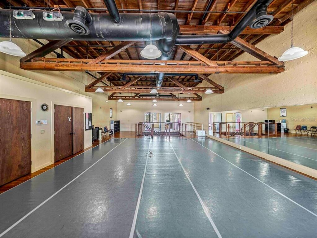 247 East Stuart Avenue Lake Wales, FL 33853 - Photo 12 of 19 a view of a swimming pool with a wooden deck