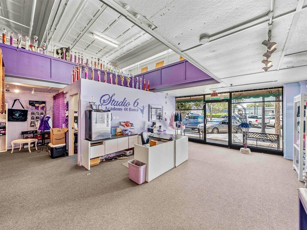 247 East Stuart Avenue Lake Wales, FL 33853 - Photo 3 of 19 a view of a room with lot of bed and a large window