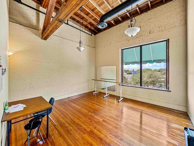 a bathroom with a sink toilet a mirror and vanity