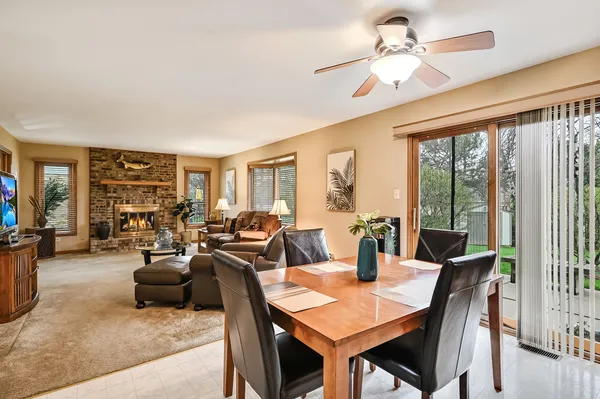a view of a dining room with furniture window and outside view