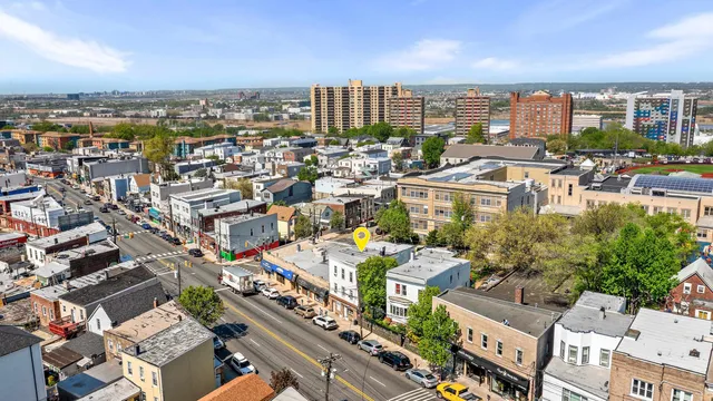 a view of a storage & utility room with racks a window