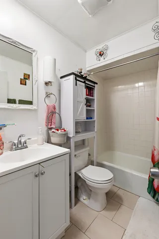 a bathroom with a toilet and a sink