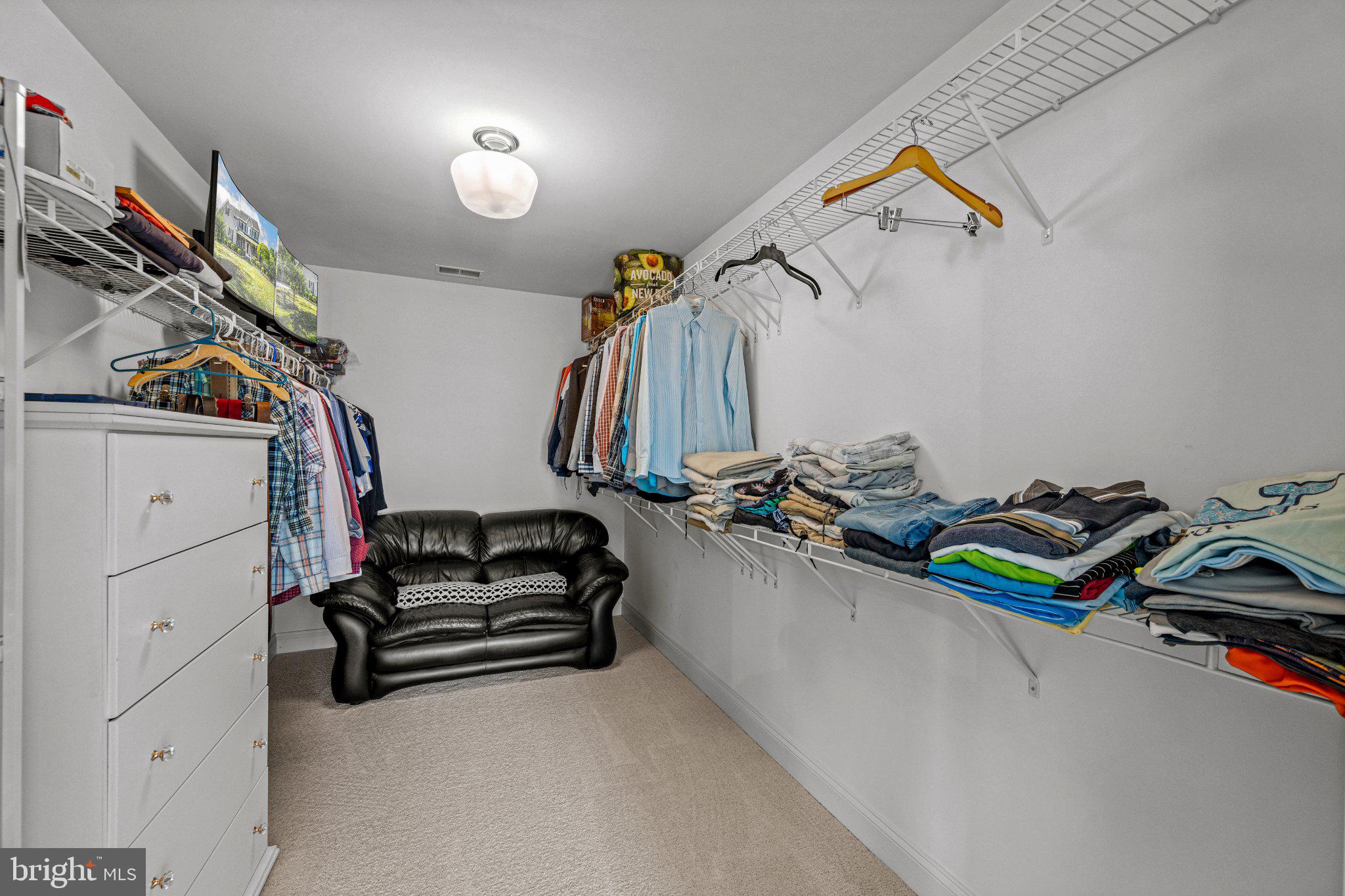 10693 Harding Road Laurel, MD 20723 - Photo 29 of 55 Spacious closet with organized storage.