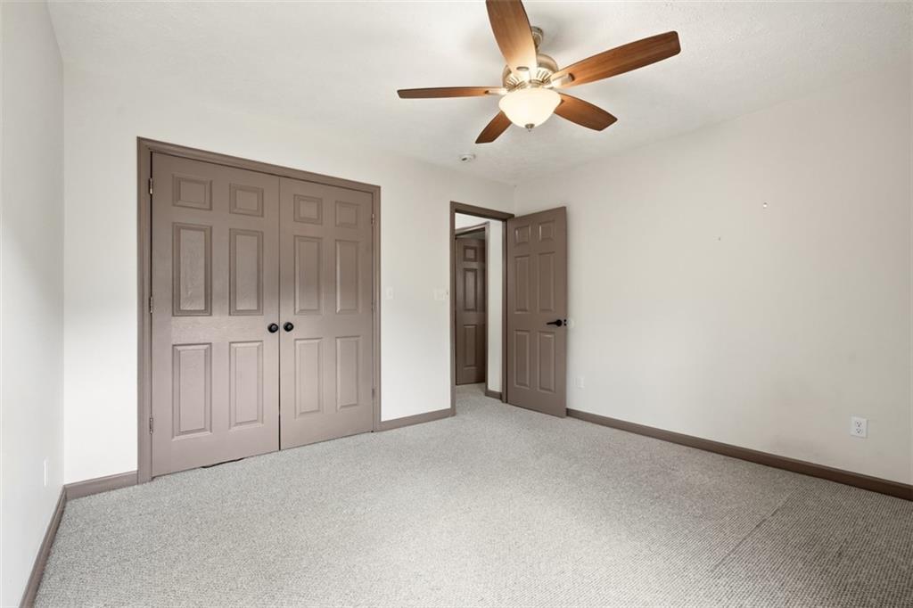 8517 Wittmer Road Pittsburgh, PA 15237 - Photo 23 of 46 an empty room with chandelier fan