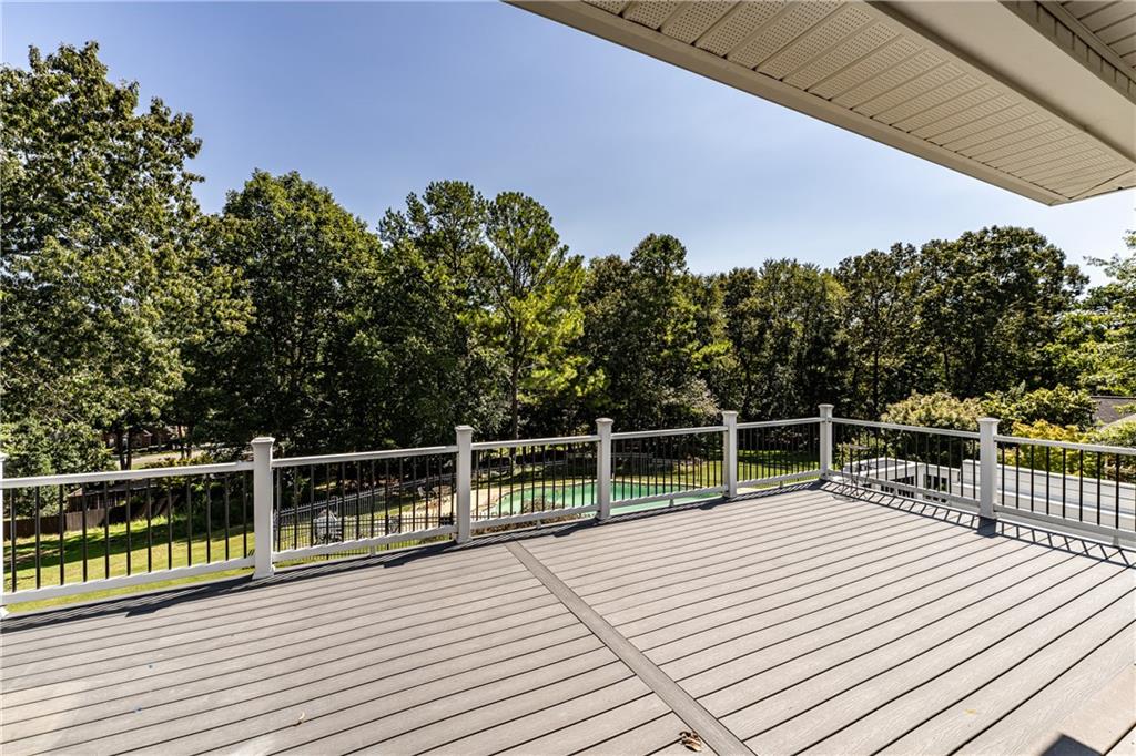 113 Warwick Way Rome, GA 30161 - Photo 42 of 49 a view of a balcony with wooden floor and fence