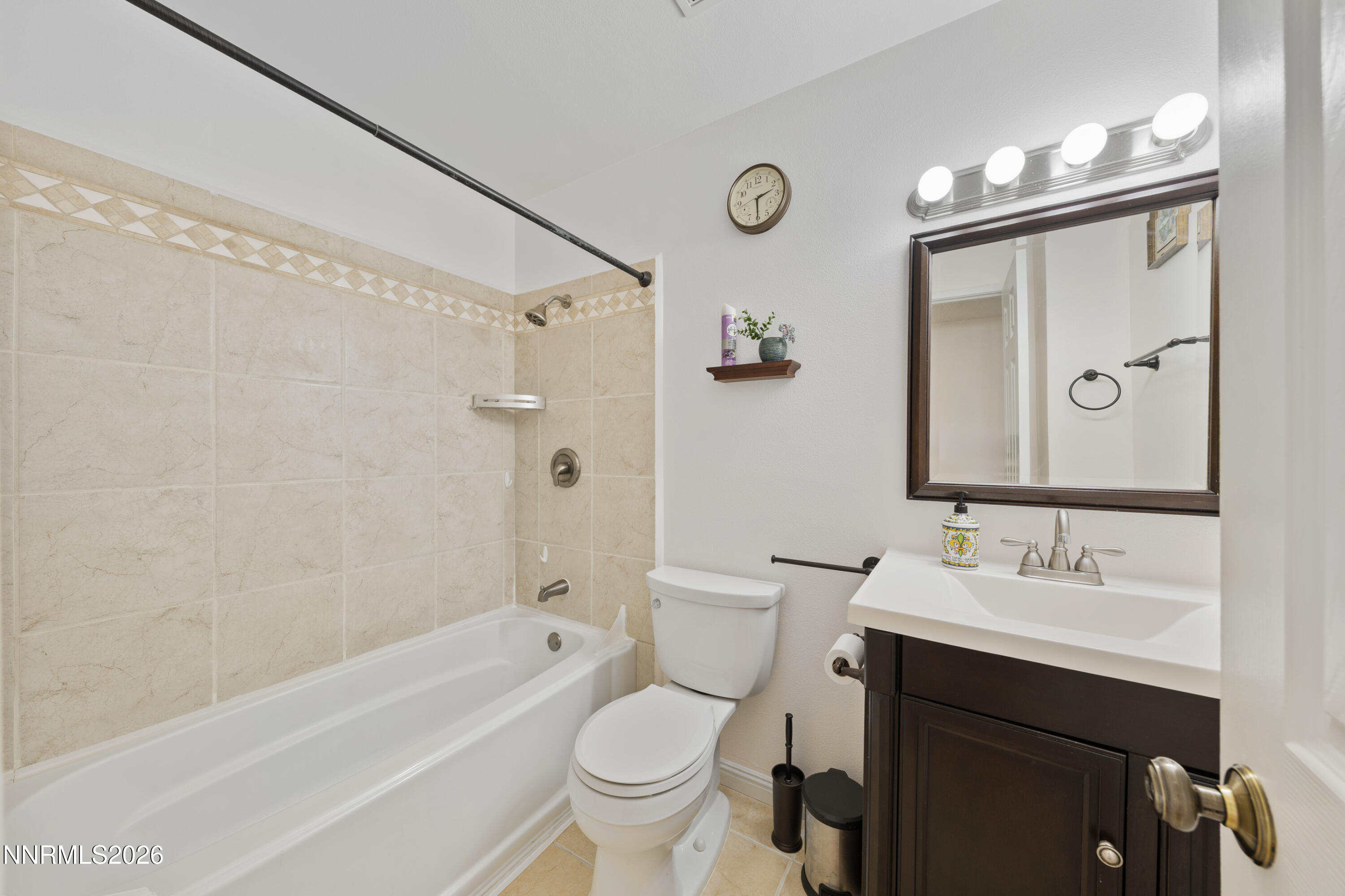 1540 Tyler Way Sparks, NV 89431 - Photo 11 of 30 a bathroom with a sink toilet and shower