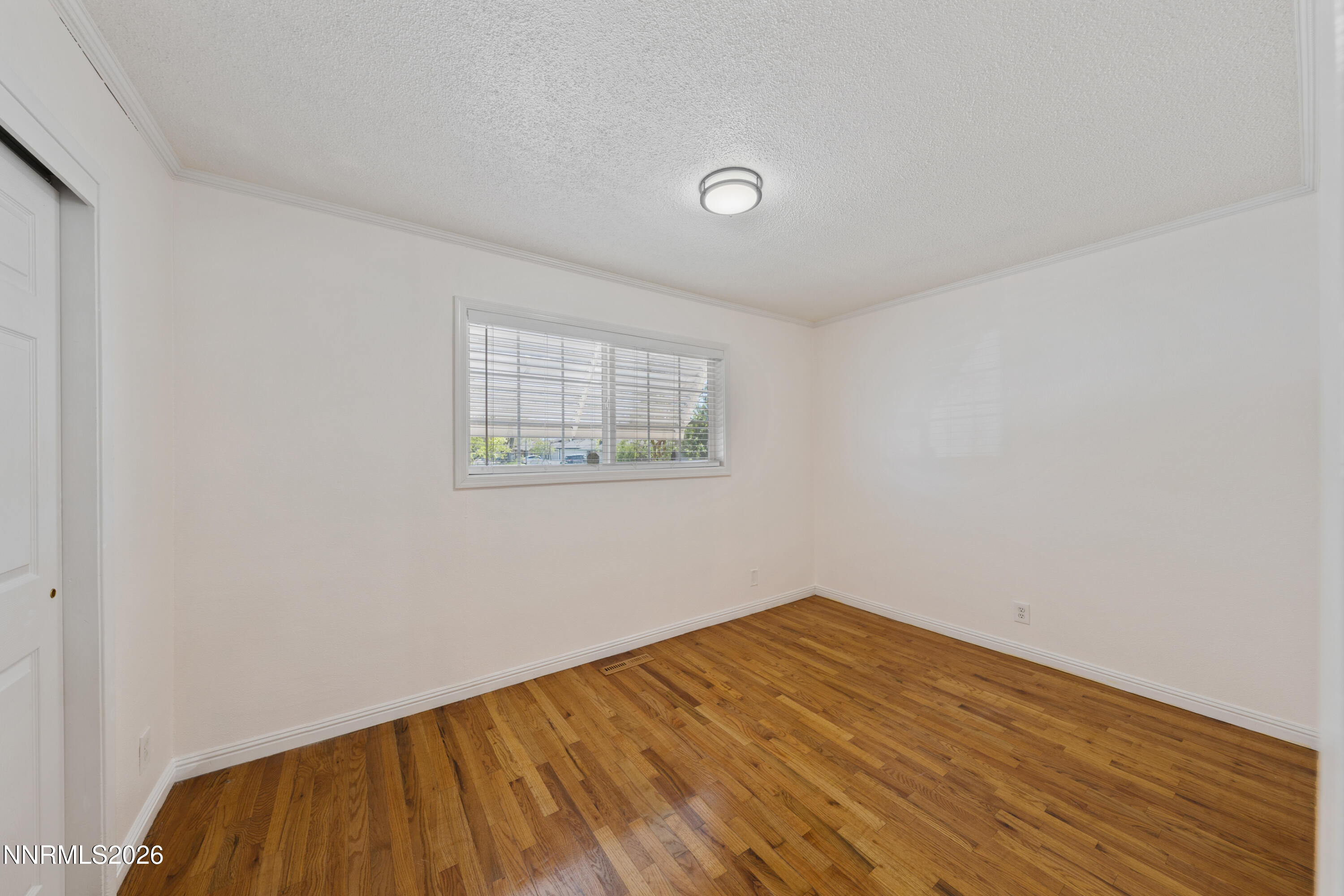 1540 Tyler Way Sparks, NV 89431 - Photo 16 of 30 an empty room with a window