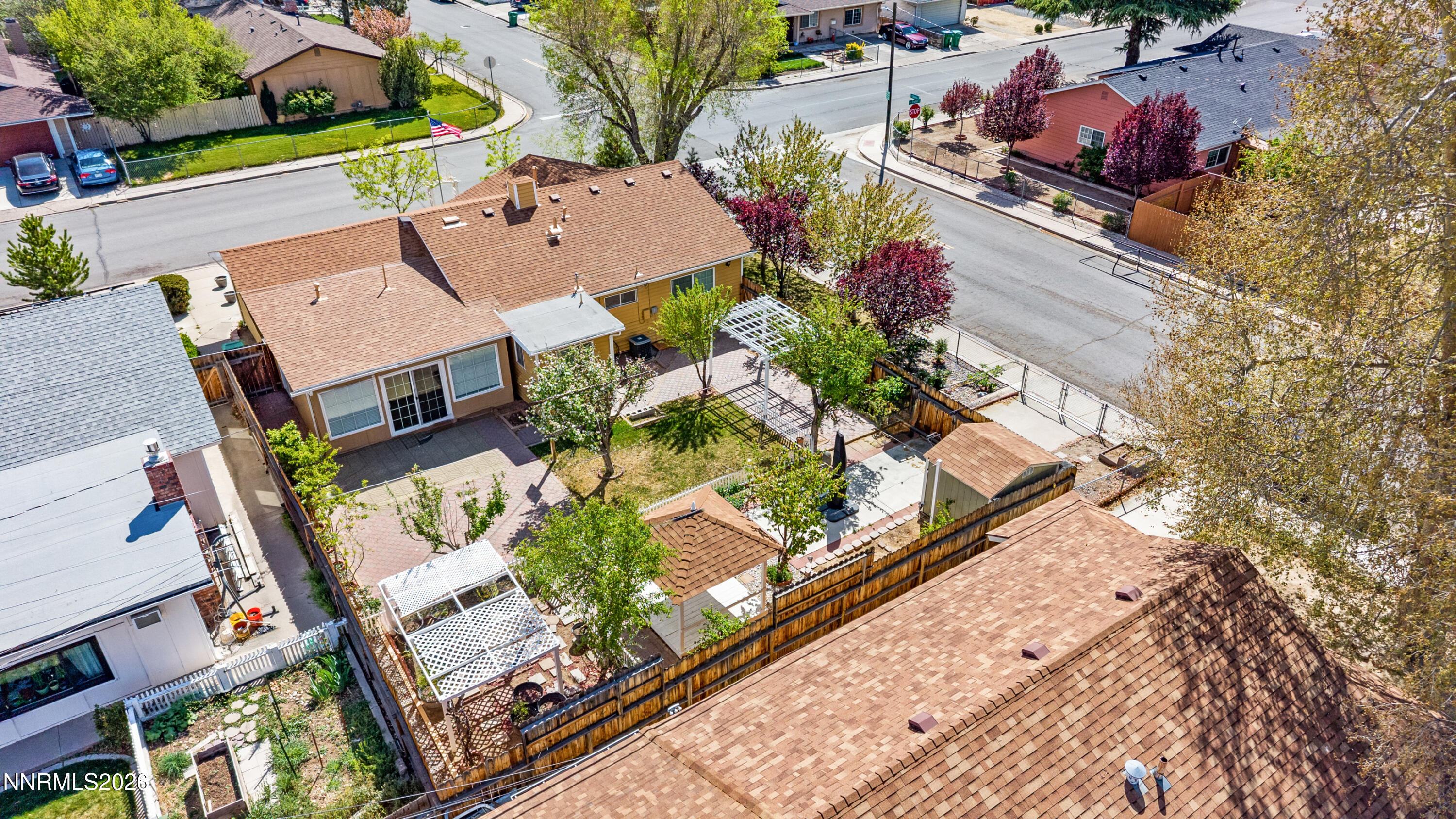 1540 Tyler Way Sparks, NV 89431 - Photo 27 of 30 an aerial view of a house with a yard and lake view