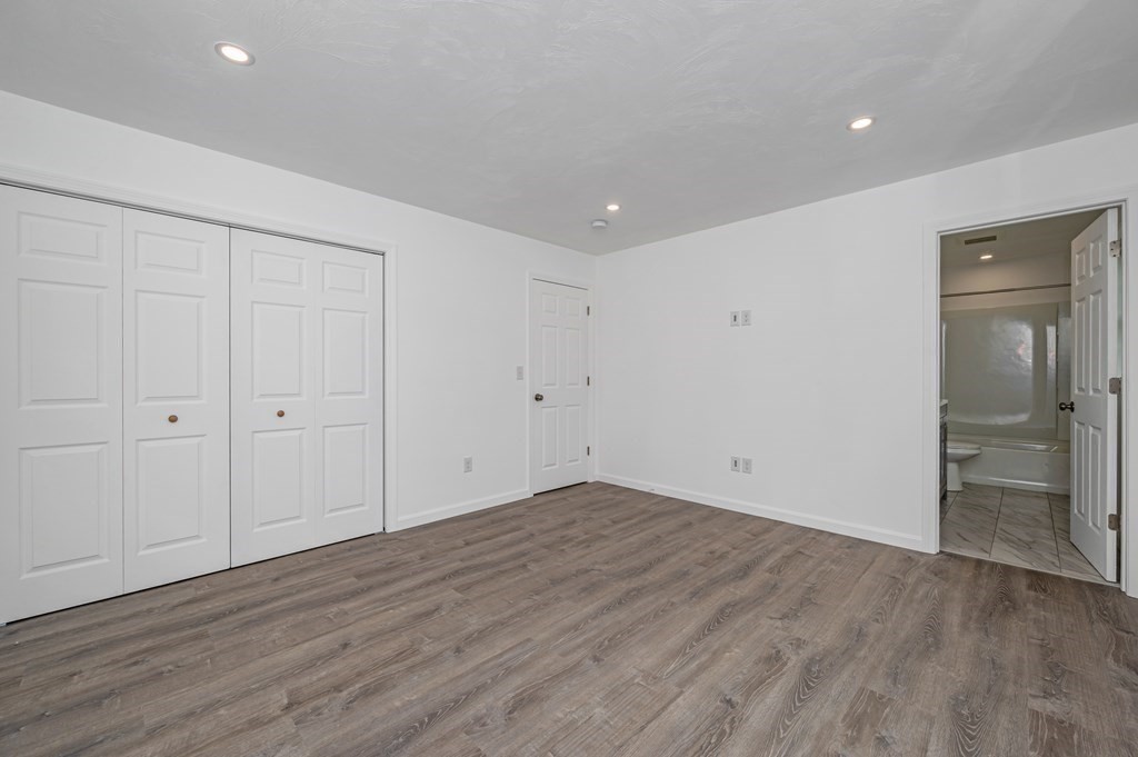 20 May Brook Road Holland, MA 01521 - Photo 20 of 28 a view of empty room with wooden floor