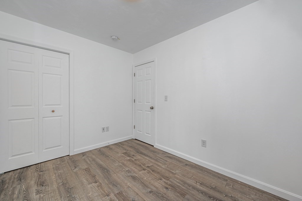 20 May Brook Road Holland, MA 01521 - Photo 22 of 28 a view of room with wooden floor